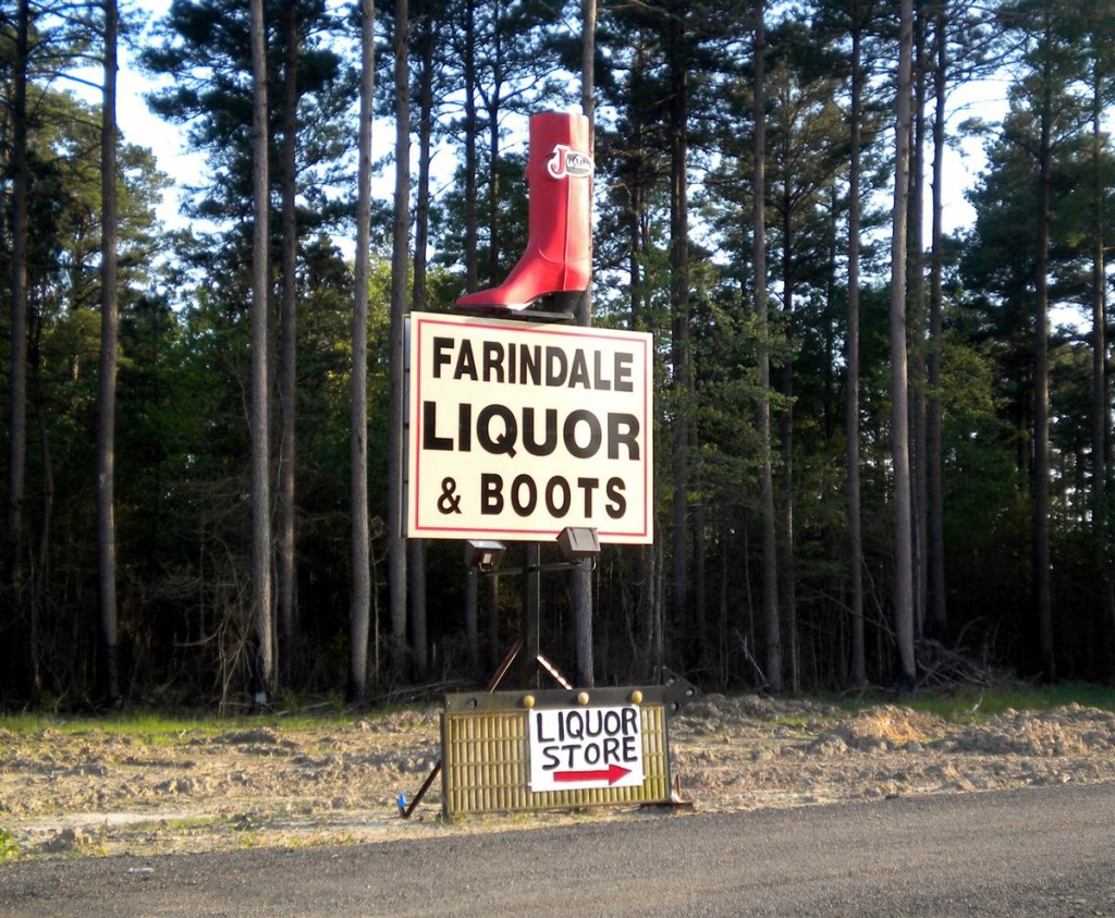 Liquor and Boots sign
